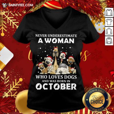 Never Underestimate A Woman Who Loves Dogs And Was Born In October Christmas V-neck- Design By Daintytee.com