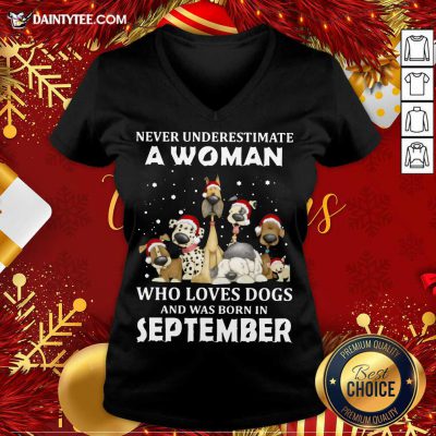 Never Underestimate A Woman Who Loves Dogs And Was Born In September Christmas V-neck- Design By Daintytee.com