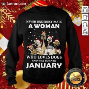 Never Underestimate A Woman Who Loves Dogs And Was Born In January Christmas Sweatshirt- Design By Daintytee.com
