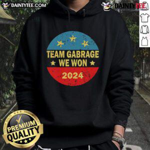 Team Garbage hoodie for Trump 2024 elections, showcasing a vibrant design and supportive message for the campaign.