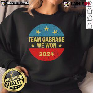 Awesome Team Garbage sweatshirt for Trump 2024 elections, featuring bold graphics and a vibrant design for supporters.