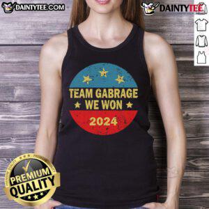 Awesome Team wearing 'Team Garbage For Trump 2024' tank tops, celebrating their support for the elections.
