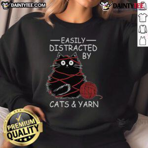 Cute kitten lover sweatshirt featuring a playful design of cats and yarn, perfect for crochet enthusiasts who easily get distracted.