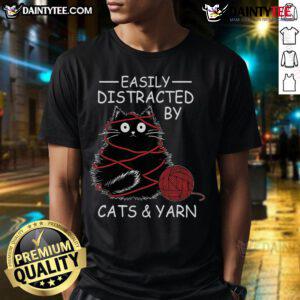Alt Text: Cute crochet T-shirt for kitten lovers, featuring a playful design of cats and yarn, perfect for cat enthusiasts.