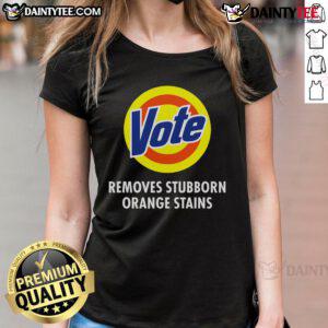 Funny Vote Removes Stubborn Orange Stains Anti-Trump Ladies Tee showcasing humorous graphic design for political humor.