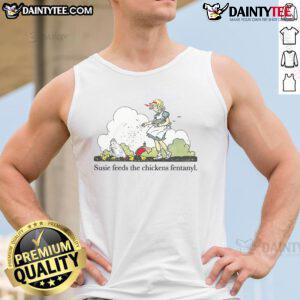 Adorable Susie wearing a fentanyl tank top, cheerfully feeding a chicken in a sunny backyard setting.