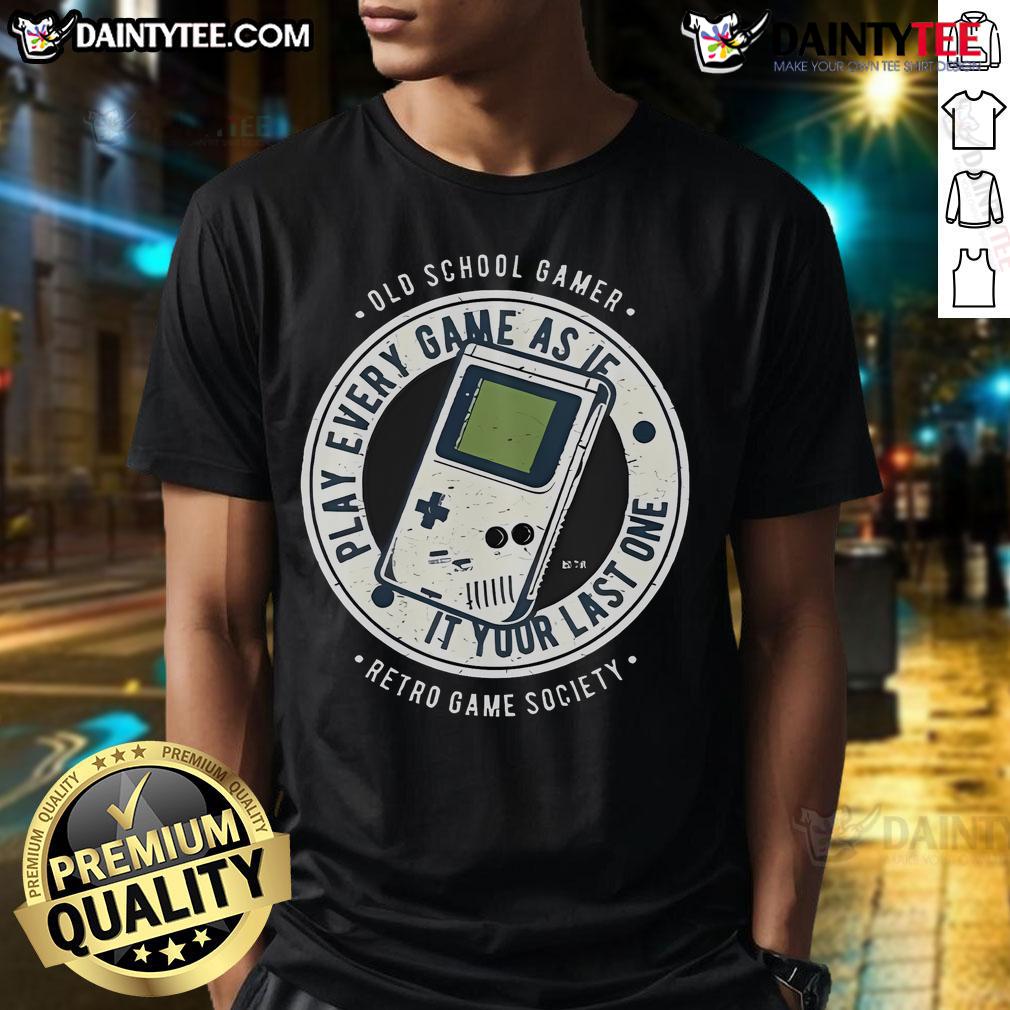Awesome old school gamer wearing a retro T-shirt that says 'Play Every Game As If It's Your Last One' in vibrant colors.