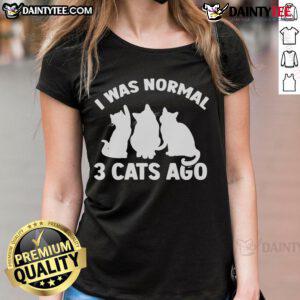 Funny 'I Was Normal 3 Cats Ago' tee featuring playful kittens, perfect for cat lovers and humorous cat-themed apparel.