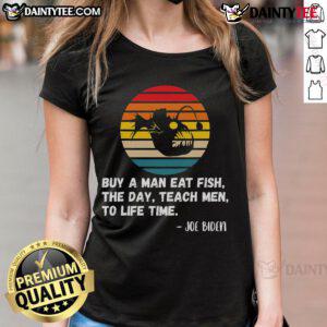 Funny Joe Biden graphic tee featuring a retro sunset design with the phrase 'Buy a man a fish' for ladies.
