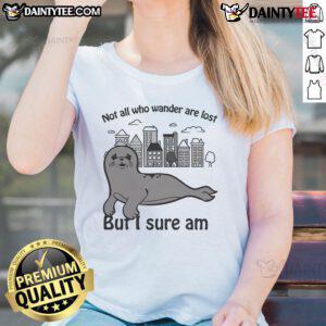 Alt Text: Funny 'Not All Who Wander Are Lost But I Sure Am' ladies tee featuring playful typography and vibrant colors.
