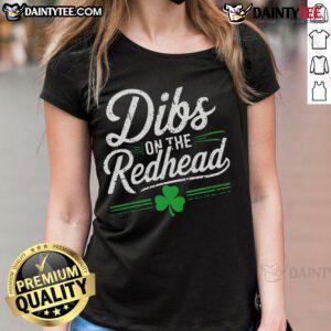 Funny St. Patrick's Day 'Dibs On The Redhead' shamrock ladies tee featuring a playful design and vibrant colors.