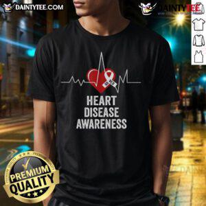Red heart t-shirt promoting heart disease awareness for Go Red in February, highlighting health and support.