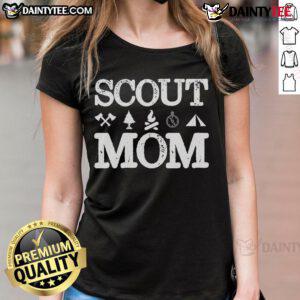 Alt Text: Good Scout Mom in a camping scene, proudly wearing a Scouting Troop supporter tee, showcasing her love for scouting.