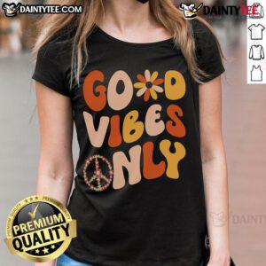 Good Vibes Only Peace Love 60s 70s Ladies Tee in vibrant colors, featuring retro design perfect for nostalgic fashion lovers.