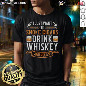 Man enjoying a Nice Cuban Cigar and Whiskey, wearing a Relax T-Shirt, embodying a laid-back lifestyle.