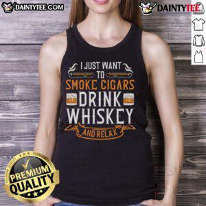 Relaxed drinker enjoying a nice Cuban cigar and whiskey in a tank top, perfect for scotch lovers and casual gatherings.