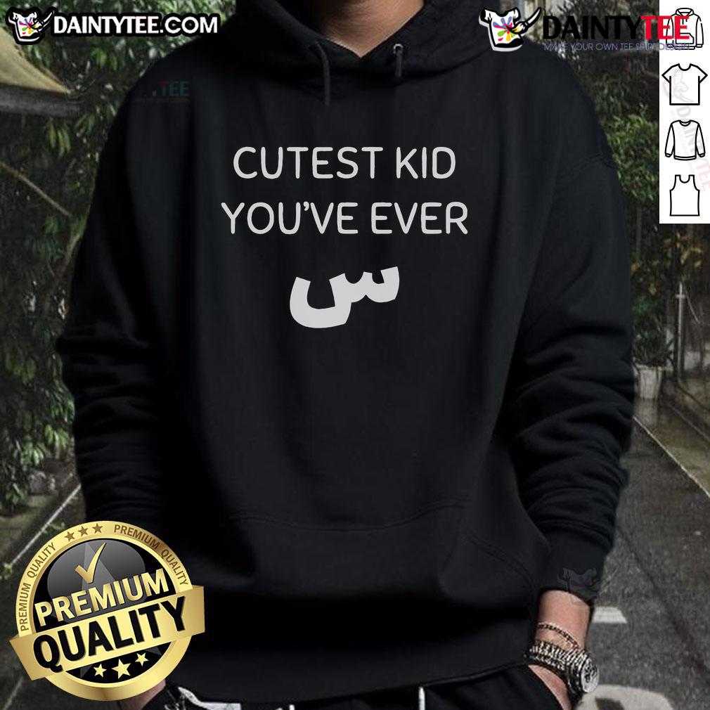 Cute kid wearing a cozy hoodie, showcasing the cutest style you've ever seen in a vibrant outdoor setting.