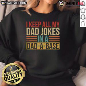 Funny 'Nice, I Keep All My Dad Jokes in a Dadabase' sweatshirt displayed on a casual background, perfect for dad joke lovers.