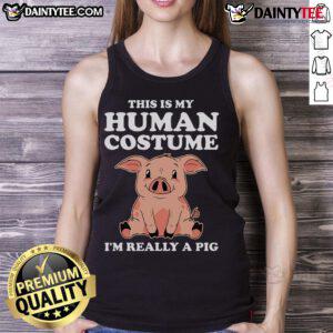 Funny tank top featuring a cute pig design with the text 'This Is My Human Costume, I'm Really A Pig.'