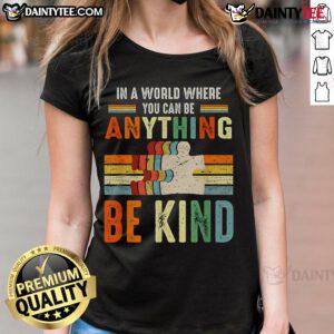 Vintage retro ladies tee with 'Be Kind' slogan in a world where you can be anything, perfect for casual wear.