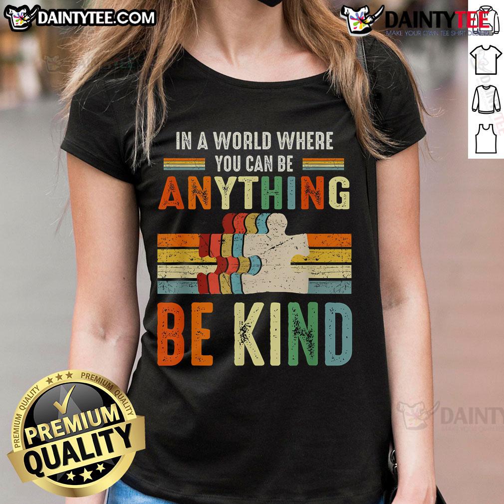Vintage retro ladies tee with 'Be Kind' slogan in a world where you can be anything, perfect for casual wear.