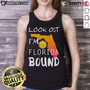 Good Look Out I'm Florida Bound Vacation Spring Break tank top displayed on a sunny beach background.