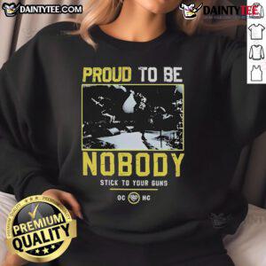 Good Stick To Your Guns Proud To Be Nobody sweatshirt in black, featuring bold graphic design and comfortable fit.