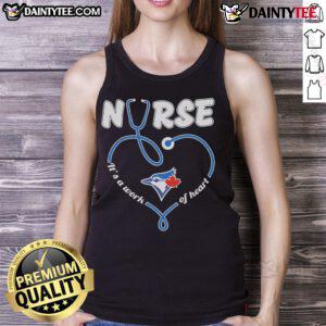 Alt Text: Good Toronto Blue Jays nurse tank top featuring 'It's a Work of Heart' design, perfect for fans and healthcare workers.