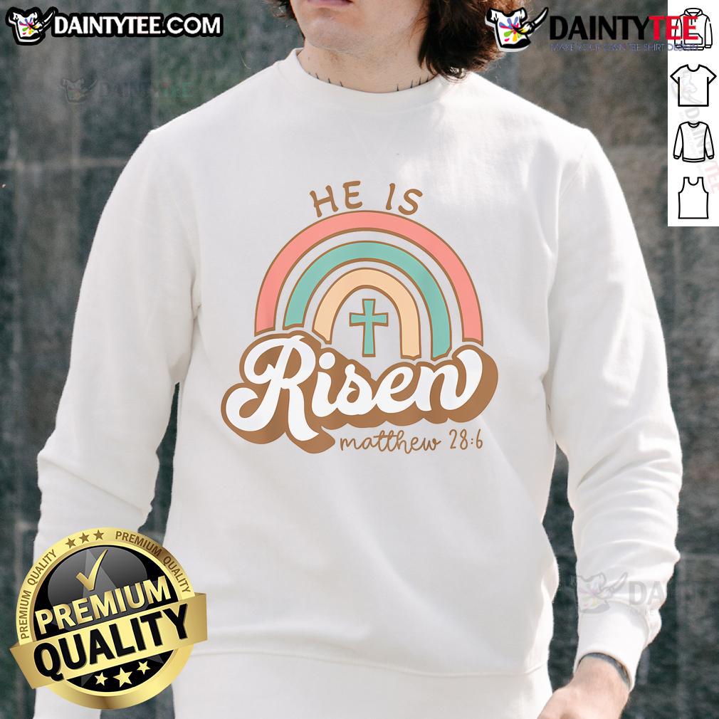 Alt Text: Vintage Easter sweatshirt featuring a vibrant rainbow cross and the phrase Happy He Is Risen for festive spring celebrations.