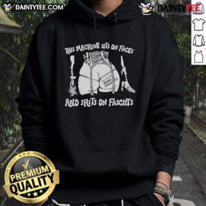 Hot This Machine Sits On Faces And Shits On Fascists Hoodie - bold graphic design on a stylish black hoodie.
