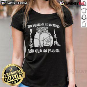 Alt Text: Hot This Machine Sits On Faces and Shits On Fascists Ladies Tee featuring bold graphic design and vibrant colors.
