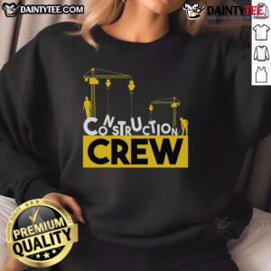 Awesome construction crew wearing matching dad sweatshirts, showcasing family unity and style in a work environment.