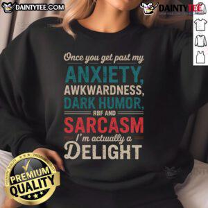 Cozy sweatshirt with 'I'm a Delight Once You Get Past My Anxiety Awkwardness' text, perfect for casual, humorous style.