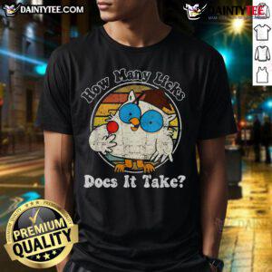 Funny owl graphic on a retro vintage T-shirt asking, 'How many licks does it take?' Perfect for owl lovers and humor fans.