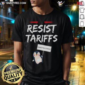 Funny penguin T-shirt design featuring 'Resist Tariffs Make Fish Cheap' slogan, perfect for humor and activism lovers.
