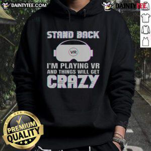 Funny hoodie with 'Stand Back I'm Playing VR' design, perfect for gamers who love humor and virtual reality adventures.