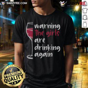 Funny warning t-shirt featuring a wine glass and the phrase 'They Are Drinking Again' for wine lovers.