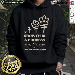 Cozy hoodie with 'Growth Is A Process' design from the Good Happiness Project, promoting self-care and personal growth.