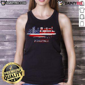 Alt Text: Stylish tank top featuring the USA flag against a vibrant Phoenix, Arizona skyline cityscape.