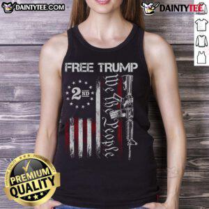 Hot pro-Trump supporter wearing a 'We The People' American flag tank top, showcasing patriotism and style.