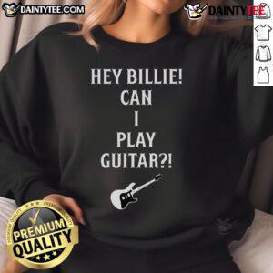 Alt Text: Official Tommy Lloyd wearing a Hey Billie, Can I Play Guitar? sweatshirt, showcasing a stylish casual look.