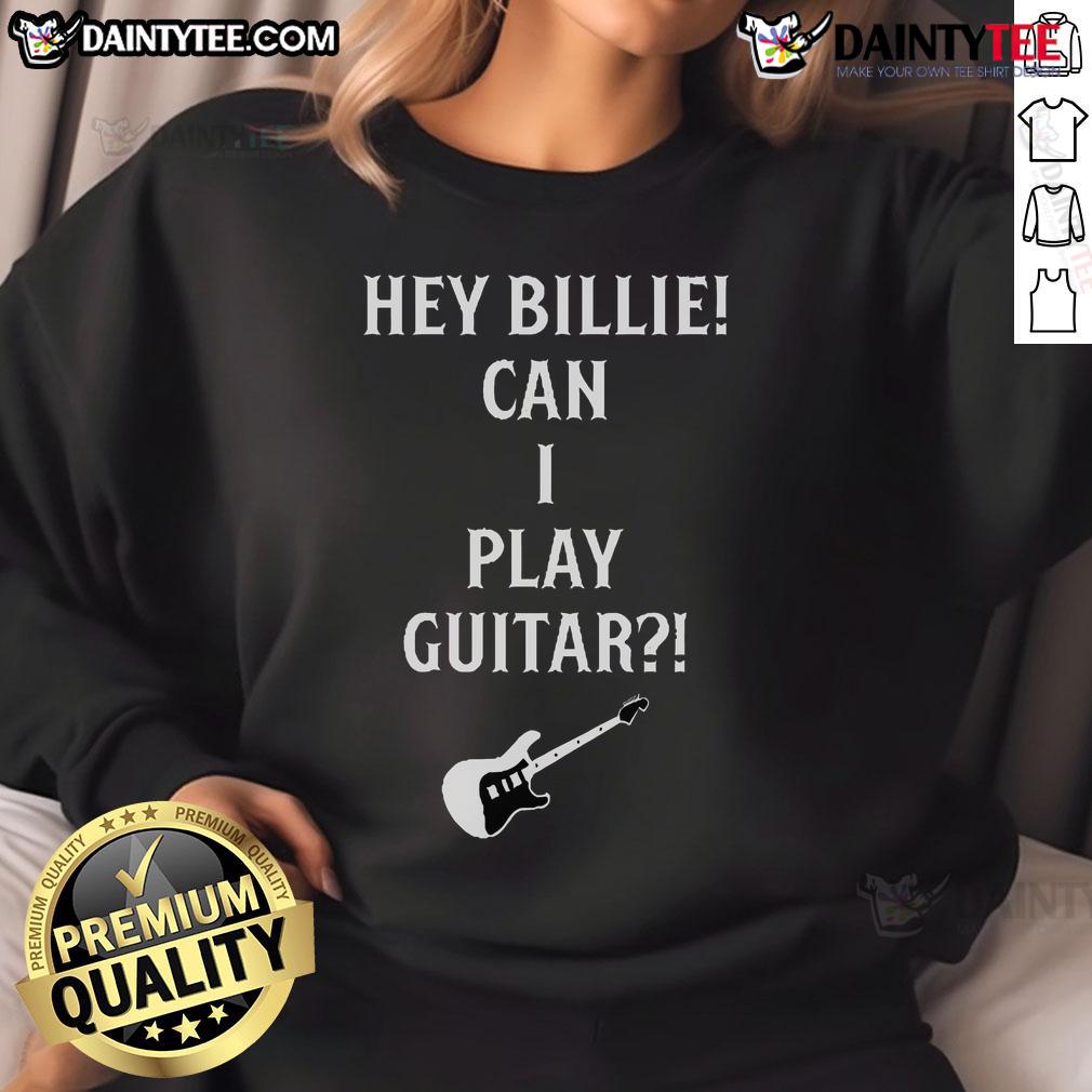 Alt Text: Official Tommy Lloyd wearing a Hey Billie, Can I Play Guitar? sweatshirt, showcasing a stylish casual look.