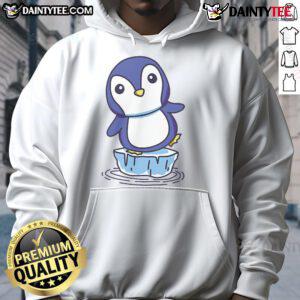 Alt Text: Cute penguin standing on an ice floe wearing a cozy hoodie, perfect for winter fashion lovers and penguin enthusiasts.