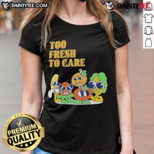 Alt Text: Cute cartoon ladies tee featuring the phrase Too Fresh, Too Care in vibrant colors and playful design.