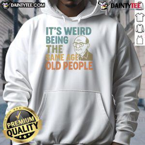 Funny hoodie with 'It's Weird Being The Same Age As Old People' design, perfect for humor lovers and quirky fashion.