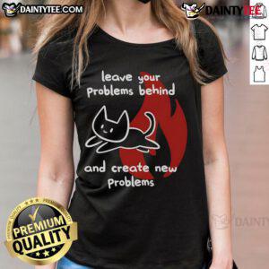 Cute cat ladies tee with a funny quote: Leave your problems behind and create new problems, perfect for humor lovers.
