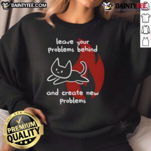 Alt Text: Cute cat sweatshirt featuring the phrase Leave Your Problems Behind and Create New Problems in fun typography.