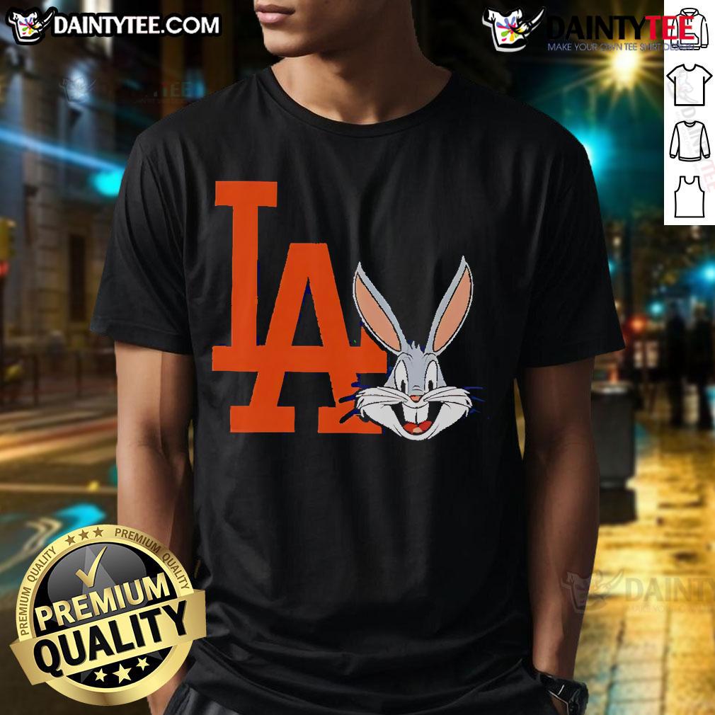 Funny Los Angeles Dodgers Looney Tunes 2025 baseball t-shirt for fans featuring vibrant graphics and playful design.
