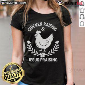 Good Chicken Raising Jesus Praising Ladies Tee featuring vibrant graphics of chickens and faith-inspired designs.