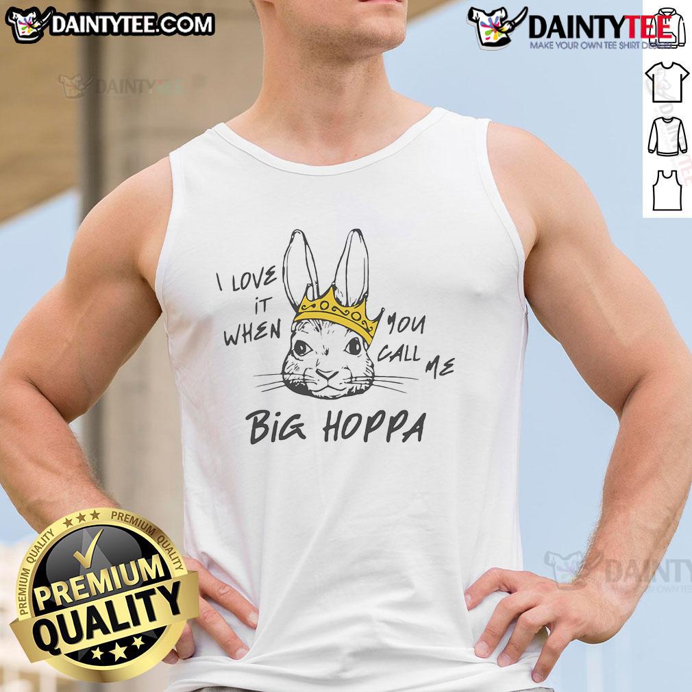 Man wearing a 'Good I Love It When You Call Me Big Hoppa' tank top, showcasing a trendy streetwear style.